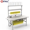 Packing bench table station with bubble pack wrap roll cutting machine carton storage shelf