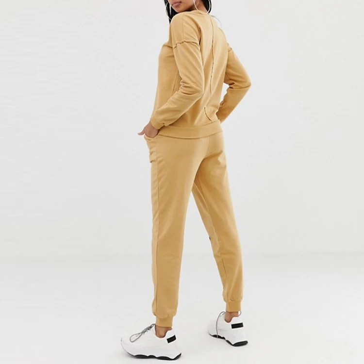 women's yellow jogging suit