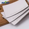 Guangzhou custom debossed printing logo white leather jeans patch,