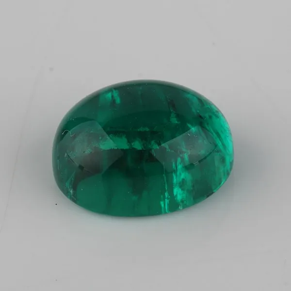 Labcreated High Quality 7x5mm Oval Cut Well Polished Cabochon Green Color Hydrothermal Emerald