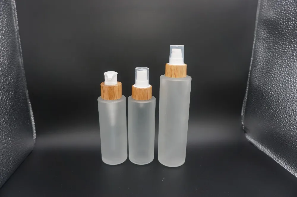 Cosmetic Packaging Frosted Glass Body Lotion Bottle Cover With Bamboo Lotion Pump Lid Buy Body