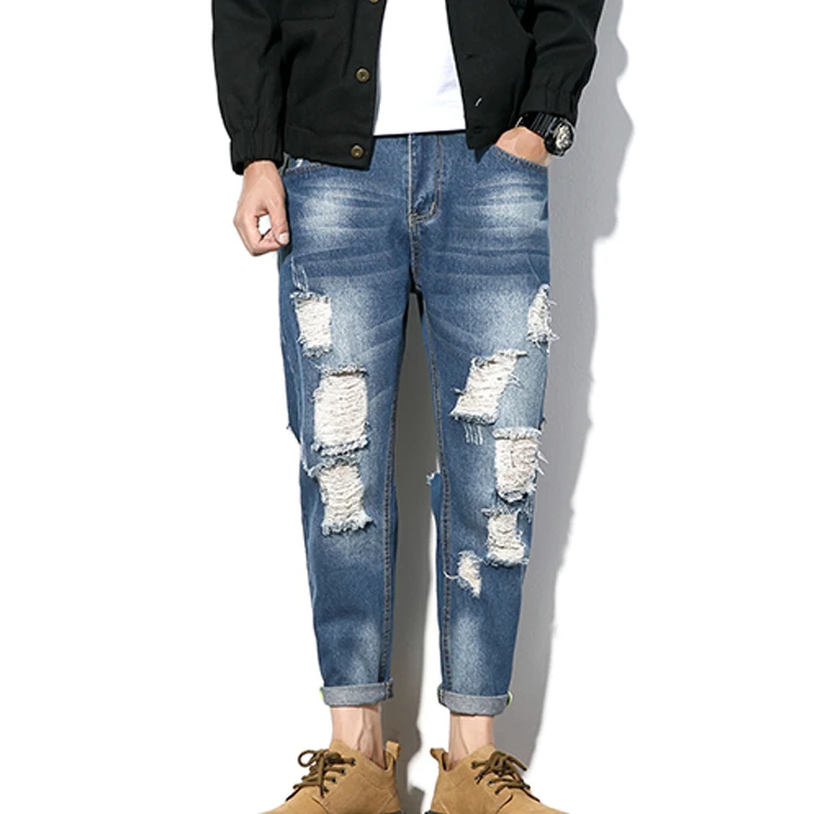 grey cut up jeans