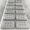 Customized high density graphite two part molds for casting copper strip