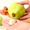 /product-detail/wholesale-stock-small-order-creative-kitchen-tool-silicone-garlic-peeler-60742519424.html
