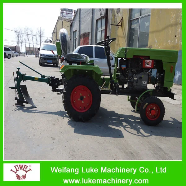 12hp small tractor with single plough.jpg