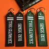 2018 China Manufacturer 3D Custom Logo Branded Name Embroidery Tag Promotional Key Chains