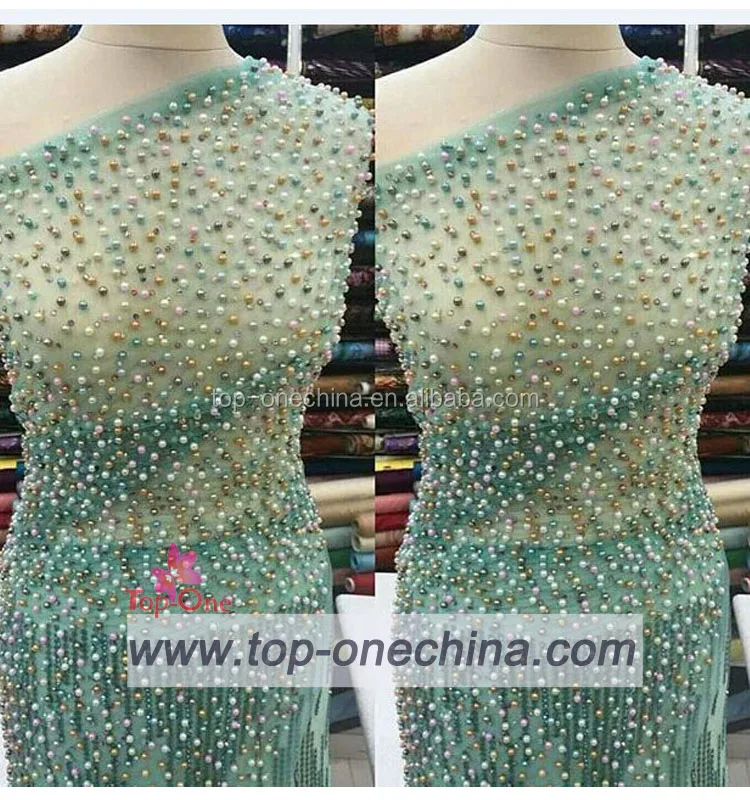 green beaded lace fabric