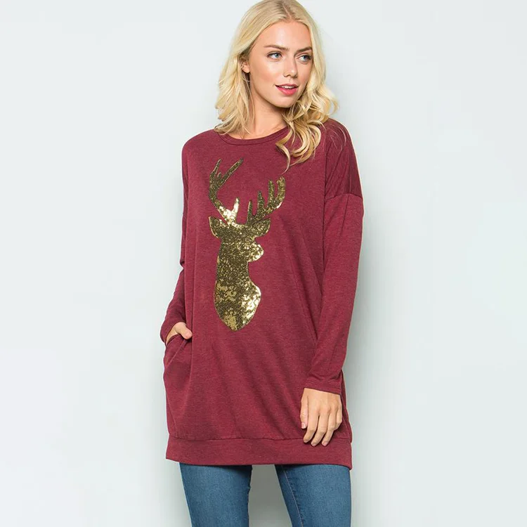 red sweater with gold sequin reindeer
