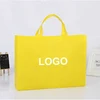 PP Woven Reinforced Handle Rich Patterns Shopping Manual Non Woven Bag Making Machine