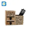 /product-detail/creative-multifunctional-desktop-wood-penholder-pen-container-with-double-drawers-62019970244.html
