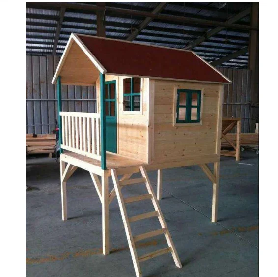 wooden playhouse with stairs
