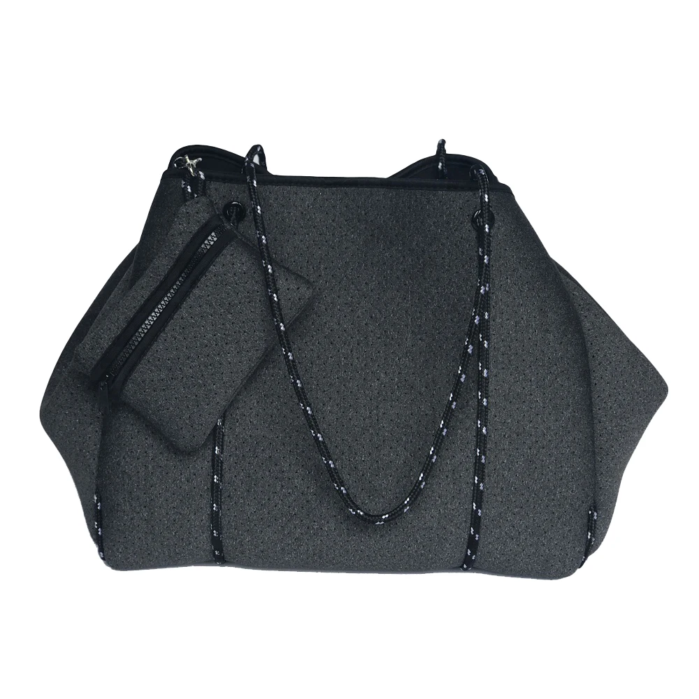 perforated neoprene messenger bag