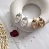 Retro Style Twisted Knotted Earrings Grinding gold plated copper ear studs for women