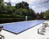 DIY automatic pool cover and reel systems keeping pool water