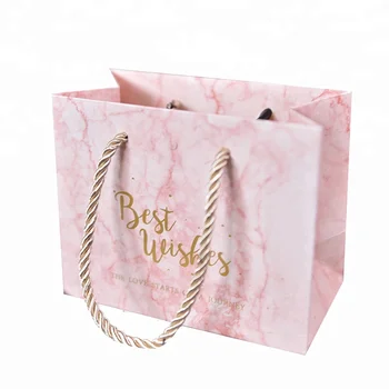 pink and gold goodie bags