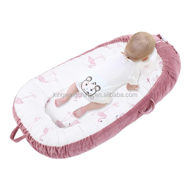 snuggle nest baby lounger