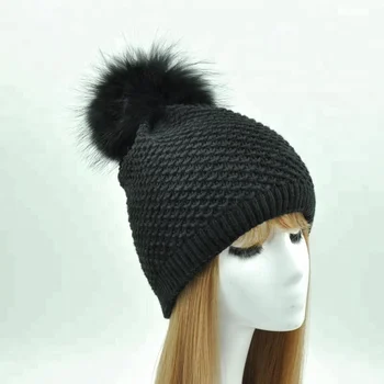 cap with pom pom on top