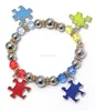 ball and puzzle piece charm autism theme stretch bracelet