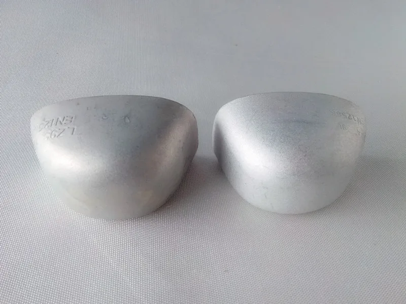 Aluminum toe cap for safety boots