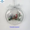 Flat clear plastic Christmas ball ornament w/ snowing Christmas scene