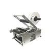 Manual Labeling Machine for round glass PET bottles with printers