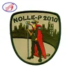 Custom cheap nolle-p 2010 embroidery patch merrow border iron on patch