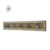 Stainless steel metal coat hook for display with linen base