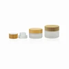 /product-detail/5g-15g-30g-50g-100g-200g-clear-frosted-glass-jar-with-certificate-child-proof-bamboo-lid-child-resistant-cometic-jars-62144134068.html