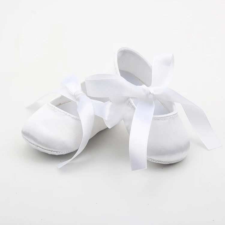 white satin baby shoes