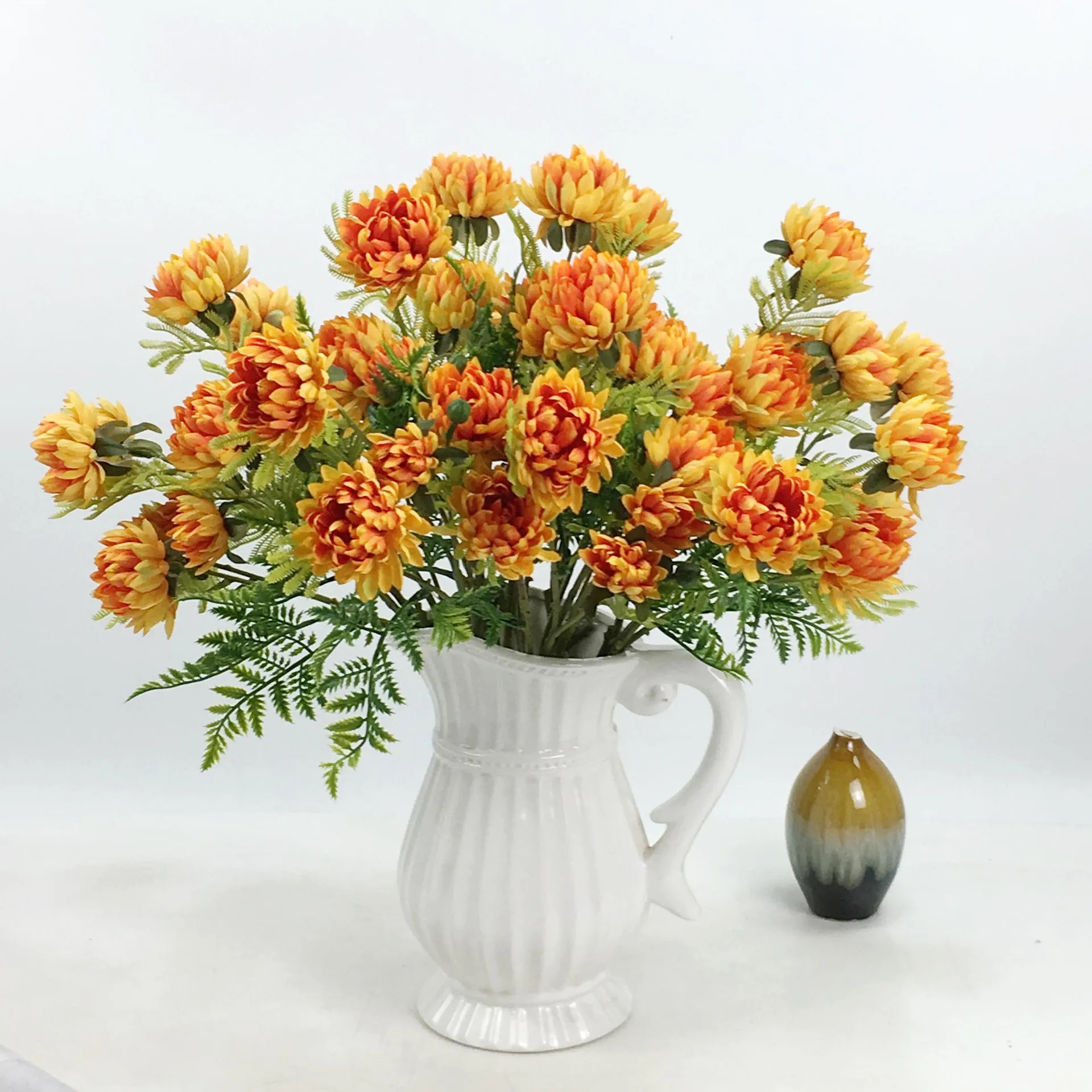 small artificial flower arrangements