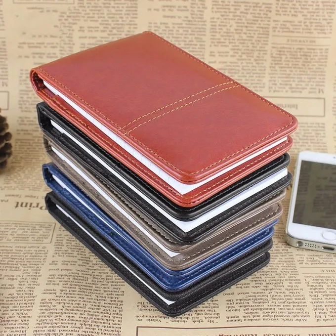 Small notepad with calculator and pen