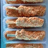 Frozen breaded mussel meat and clam meat in much stock