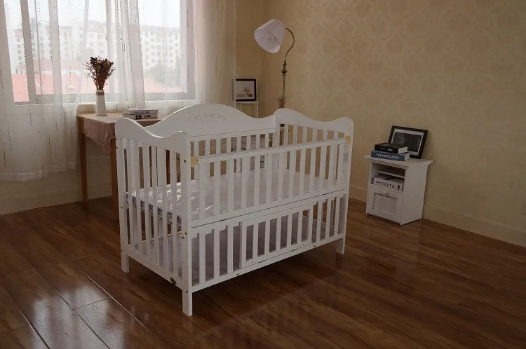 wood and white cot