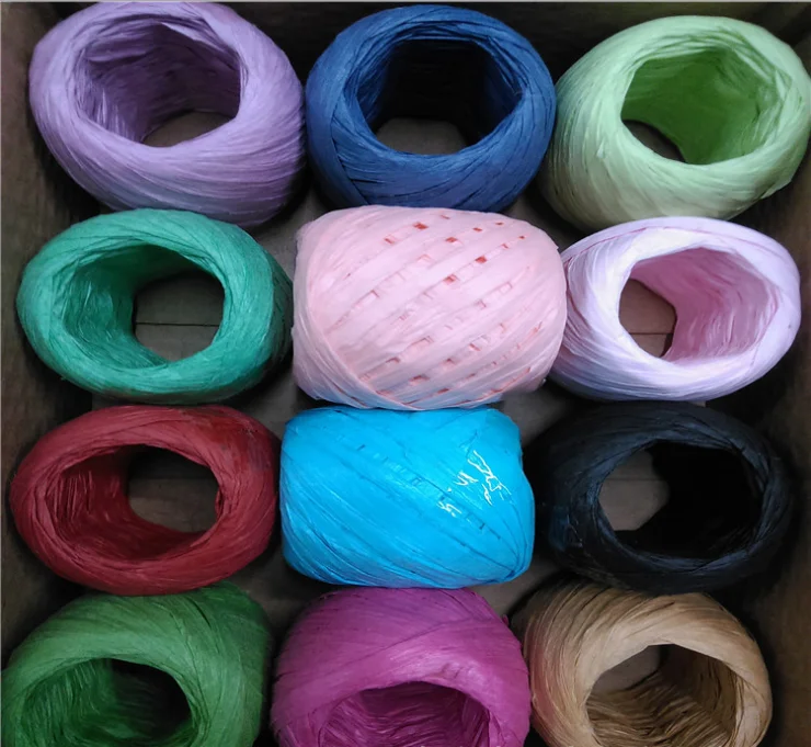 by the yarn colored raffia paper ribbon.