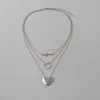 fashion tiny gold cross and silver heart jewelry multi layer silver ring and shiny heart shaped metal women necklace