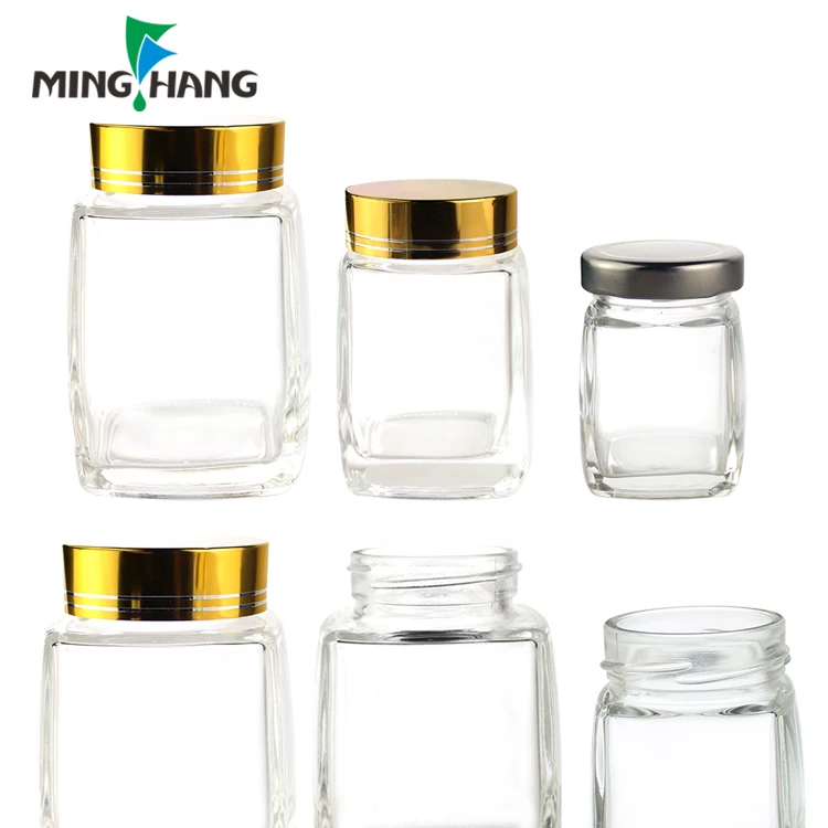 High quality 180ml 380ml clear elegant thick bottom honey packaging glass bottle sugar jar with gold aluminum cap