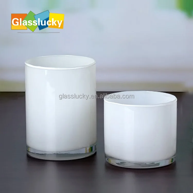 white glass candle holders