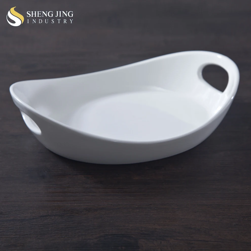 white ceramic serving platter with handles