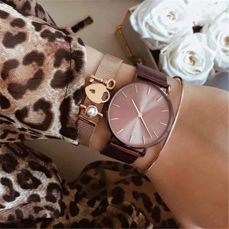 rose gold watch on wrist