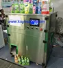 Mini spout bag filling machine/jelly sachet filling packing machine/doypack juice filling equipment