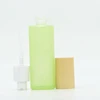 green glass lotion bottle cosmetics packaging high quality body lotion black skin bamboo top lotion