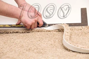 139784-425x282-trimming-carpet-with-carpet-knife
