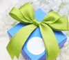 orange polyester satin pre-tied bows with a gold twist to wrap/decorate gifts/presents box