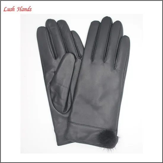 ladies winter driving black leather hand gloves with ball top