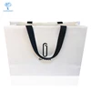 /product-detail/customized-logo-high-end-retail-kraft-paper-white-garment-paper-bag-60821195262.html