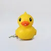 custom cartoon soft pvc key chain 3d cute led light duck plastic keychains anime rubber silicone keychain with toys lights
