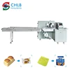 Round bread clip flow pack packing machinery small cake pillow packing machine