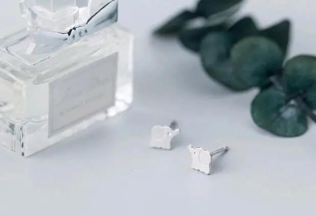 lovely simple 925 sterling silver brushed mini elephant ear studs.jpg