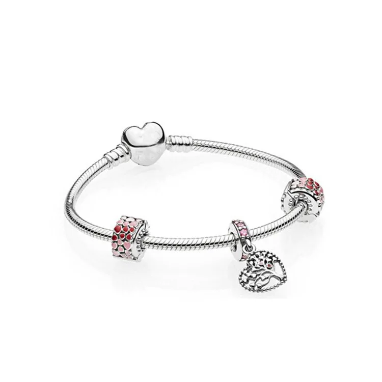 snake bracelet with charms.jpg