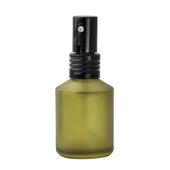 green glass spray bottle